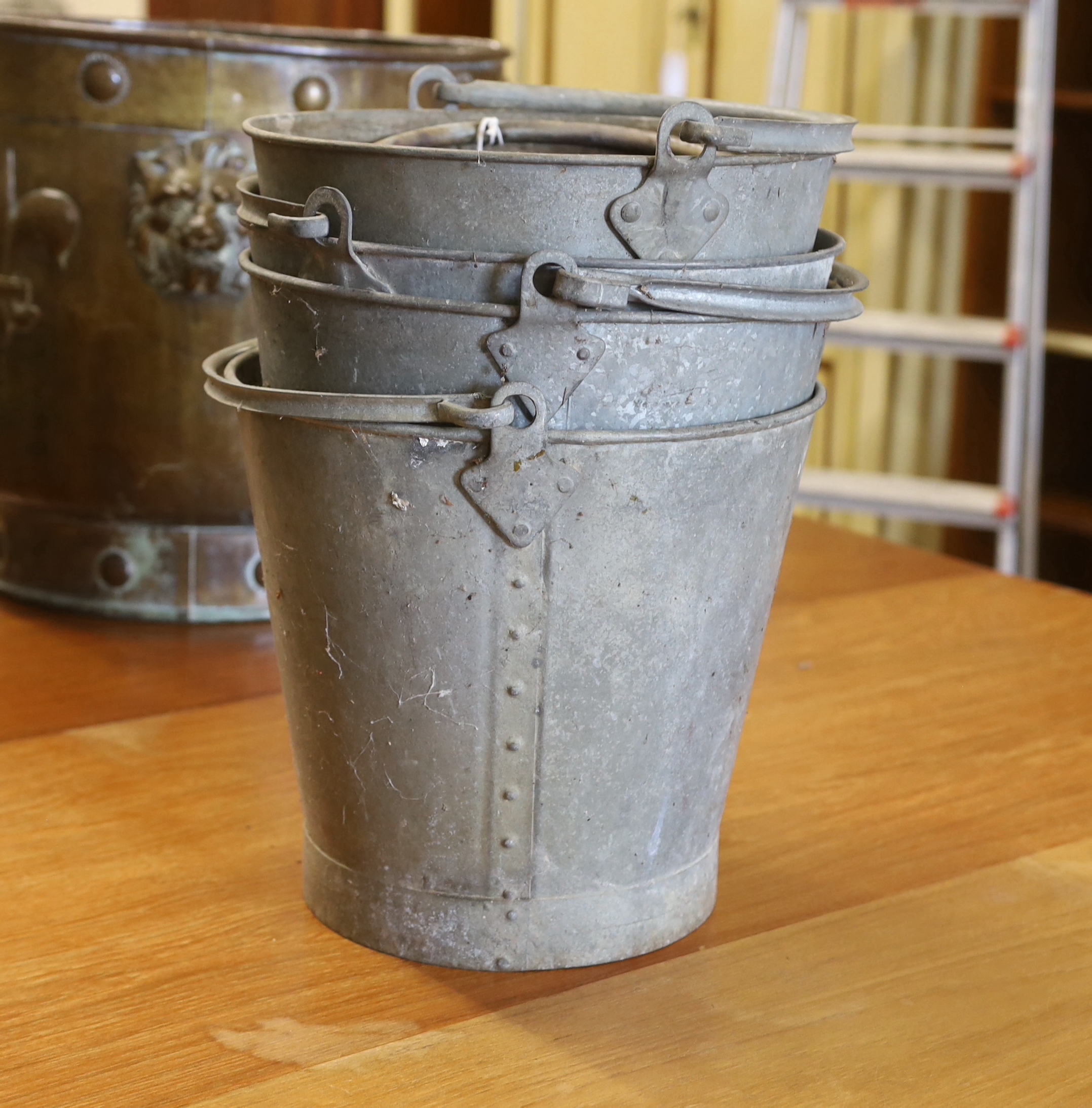 Four vintage galvanised buckets